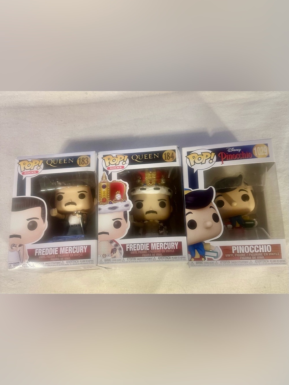 Funko Pop Lot of 3: Freddie Mercury #183, #184 (Queen) & Pinocchio #1029 (Disney